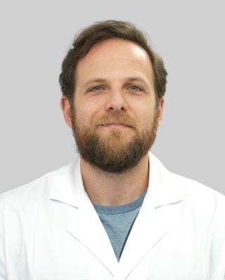 Retrato profesional de Dr. Alain Weitz Morandini